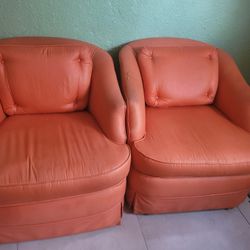 2 Orsnge Chairs