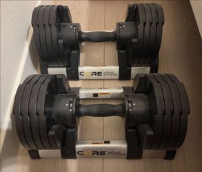 CORE adjustable dumbell set (50 lbs. Each)
