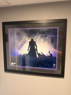 Officially Licensed WWE Autographed Framed Photos - Fanatics Authentic (Undertaker / Bron Breakker)