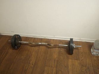 Curl Bar With 4 Ten Pound Plates 2 Five Pounds  
