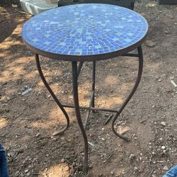 Pretty plant stand it’s 21 inches  tall and 14 inches across the top
