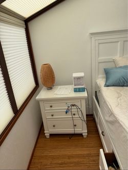 Matching White Three-Drawer Nightstands