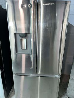 Samsung 30" wide (22cu.ft.) Stainless steel New (scratch n dent) French 3-door Refrigerator.