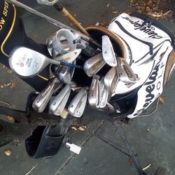Cleveland Golf Bag And Cleveland Clubs As Well As Other Good Brands+A Golf Bag Caddy Tees And Balls 