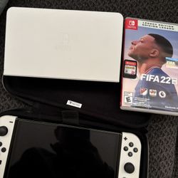 Switch OLED And Dock With 2 Games 