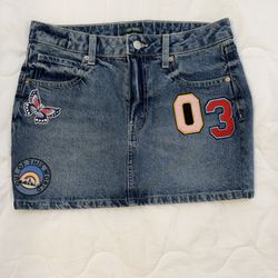 Multi-Patch Mini Jean Skirt