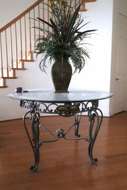 Wrought iron and marble dining table