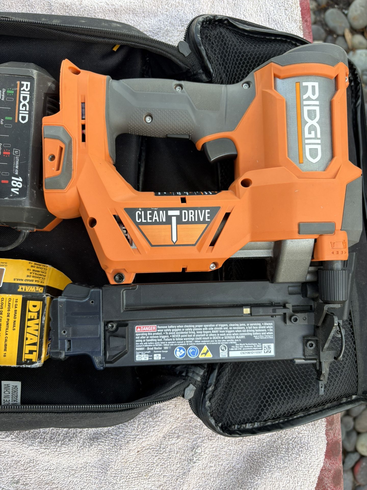 New RIDGID -18V CLEAN DRIVE Brushless Cordless 18-Gauge Brad Nailer-R09891-New/Unused- Nailer/Charger Only, Box of 2” Nails, Canvas Bag