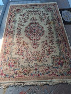 Oriental rug pastel colors , wool nine by twelve