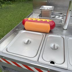 One used hotdog cart