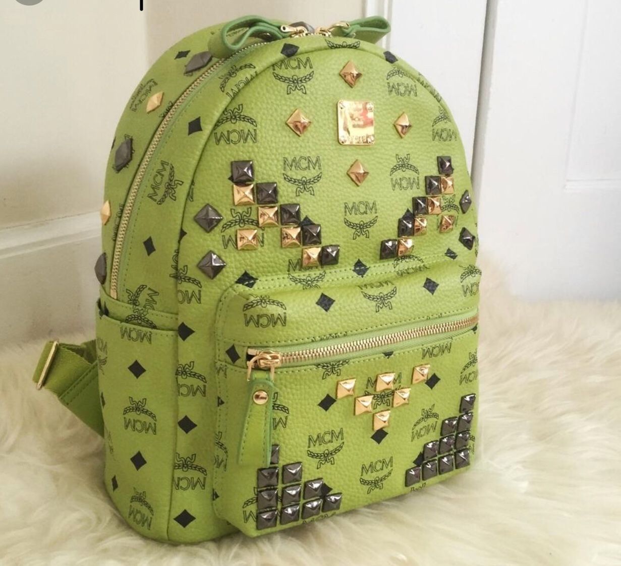 Lime green mcm backpack hotsell