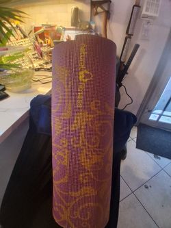 Natural Fitness Eco-Smart Yoga Mat with a floral mandala pattern and a 6mm thickness.