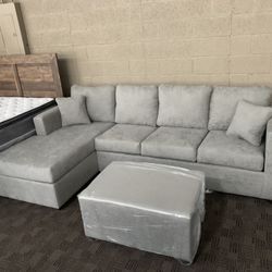 New Grey Sectional And Ottoman 