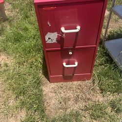old metal file cabinet its him 28 inches tall 15 inches wide and  18 inches deep