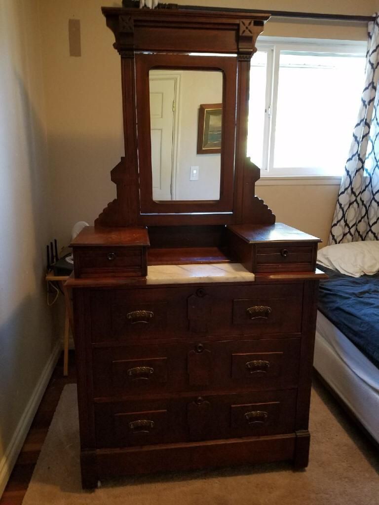 Antique marble top dresser with tilt mirror, mid 1800s