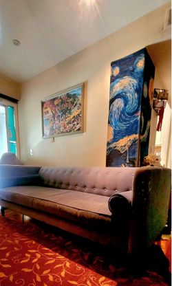 Soft blue velvet couch