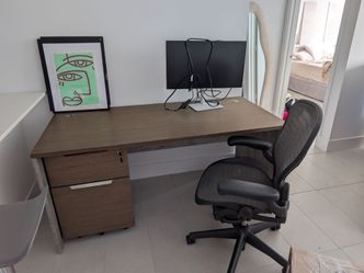 Wood office desk with cabinet and chair