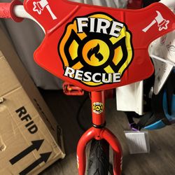 BRAND NEW Training Wheel Bike w/attached helmet