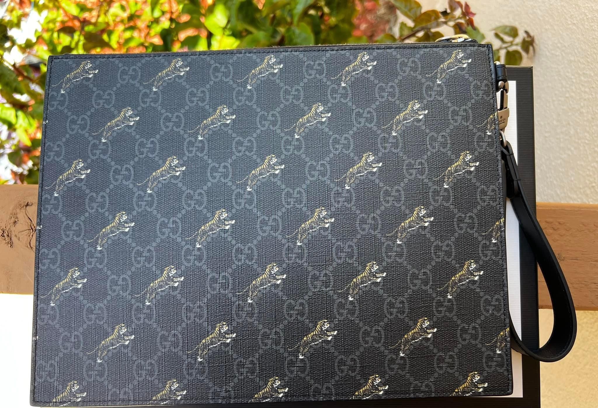 Gucci Supreme wristlet
