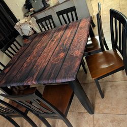 Heavy Table & 8 Heavy Chairs &  1 Fitted Table Cloth 