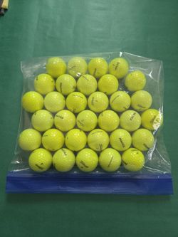 32 like new Titleist Yellow-greenish Practic Golf Balls - balanced numbers 1-4