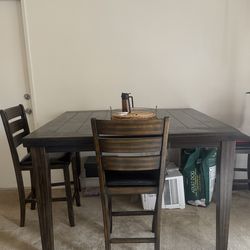 Counter height dining table