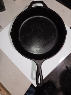 Lodge 10.25 inch cast iron skillet like new old stock.