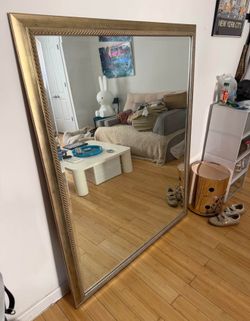 Large antique floor mirror