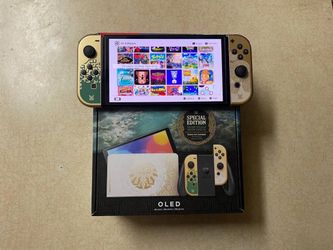 NINTENDO SWITCH OLED + 125 POPULAR SWITCH GAMES INCLUDED