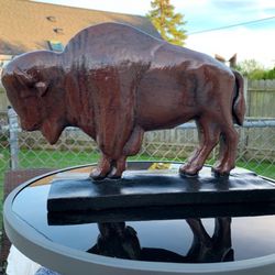 The classic brown buffalo statue