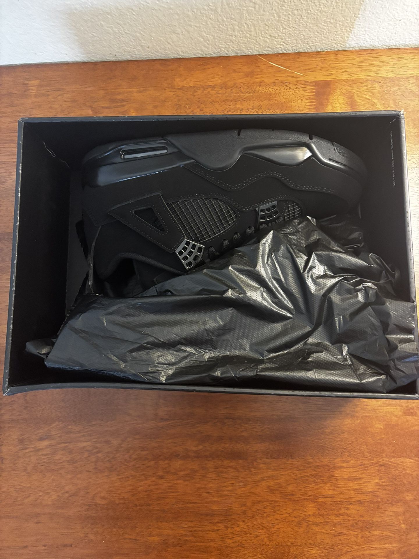 Black Cat Jordan 4