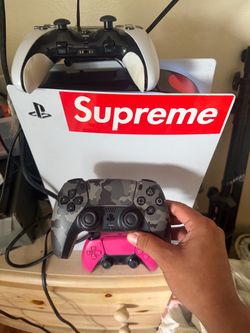 PS5 with 3 controllers, headset, and cables