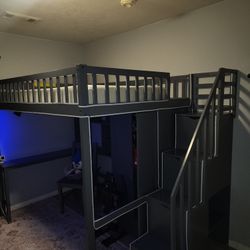 Elevated Bunkbed With Closet, Desk, Chair, and Staircase 