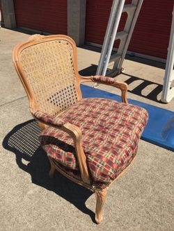 Upholstered cane back chair