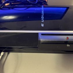 PS3, Two Controllers, And Games 