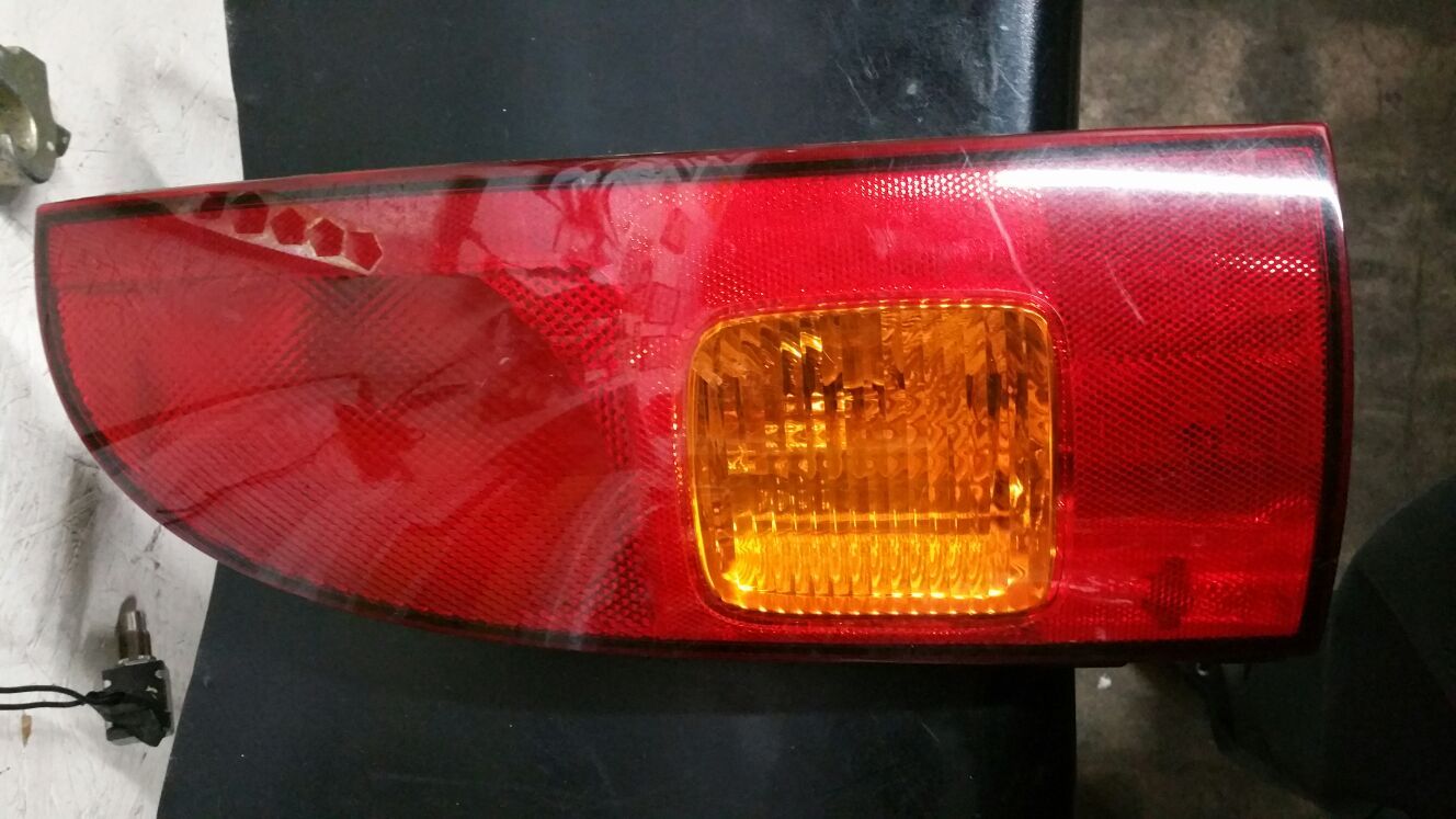 99 quest right tail light