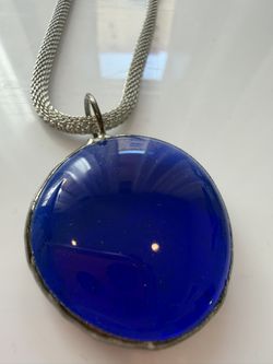 Stunning cobalt blue sea glass or lapis lazuli pendant necklace set in a silver bezel