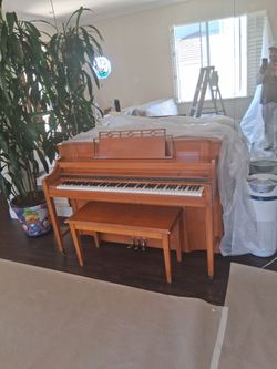 Piano de banca en buenas condisiones