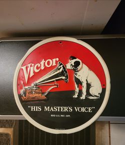 Victor dog advertising sign