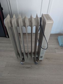 Radiator type space heater(cash only)