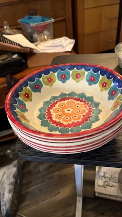 Six plastic bowls