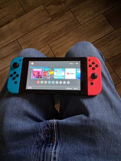 Nintendo switch system joycons and games