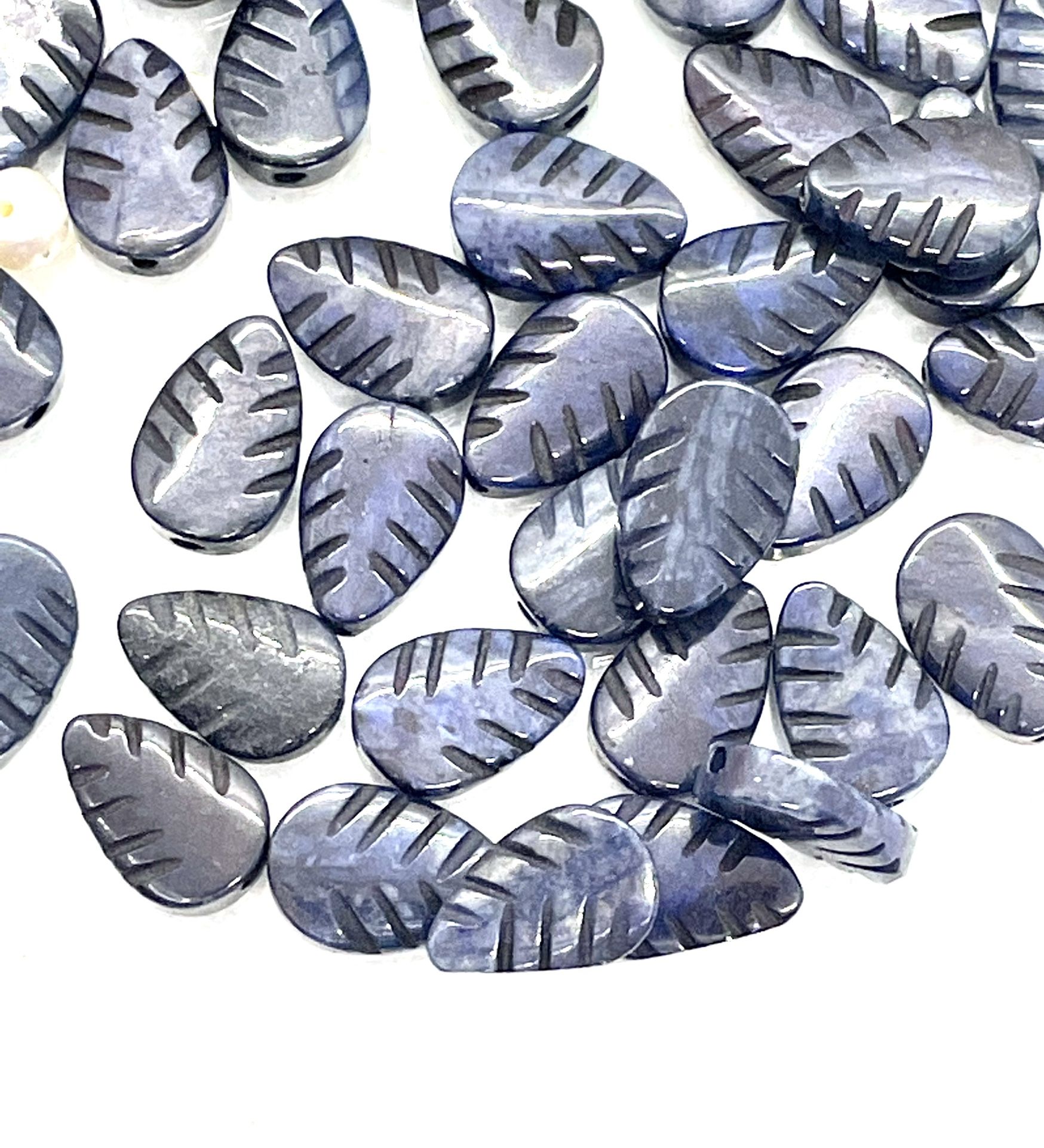 Lot Of Carved Sodalite Leaf Beads