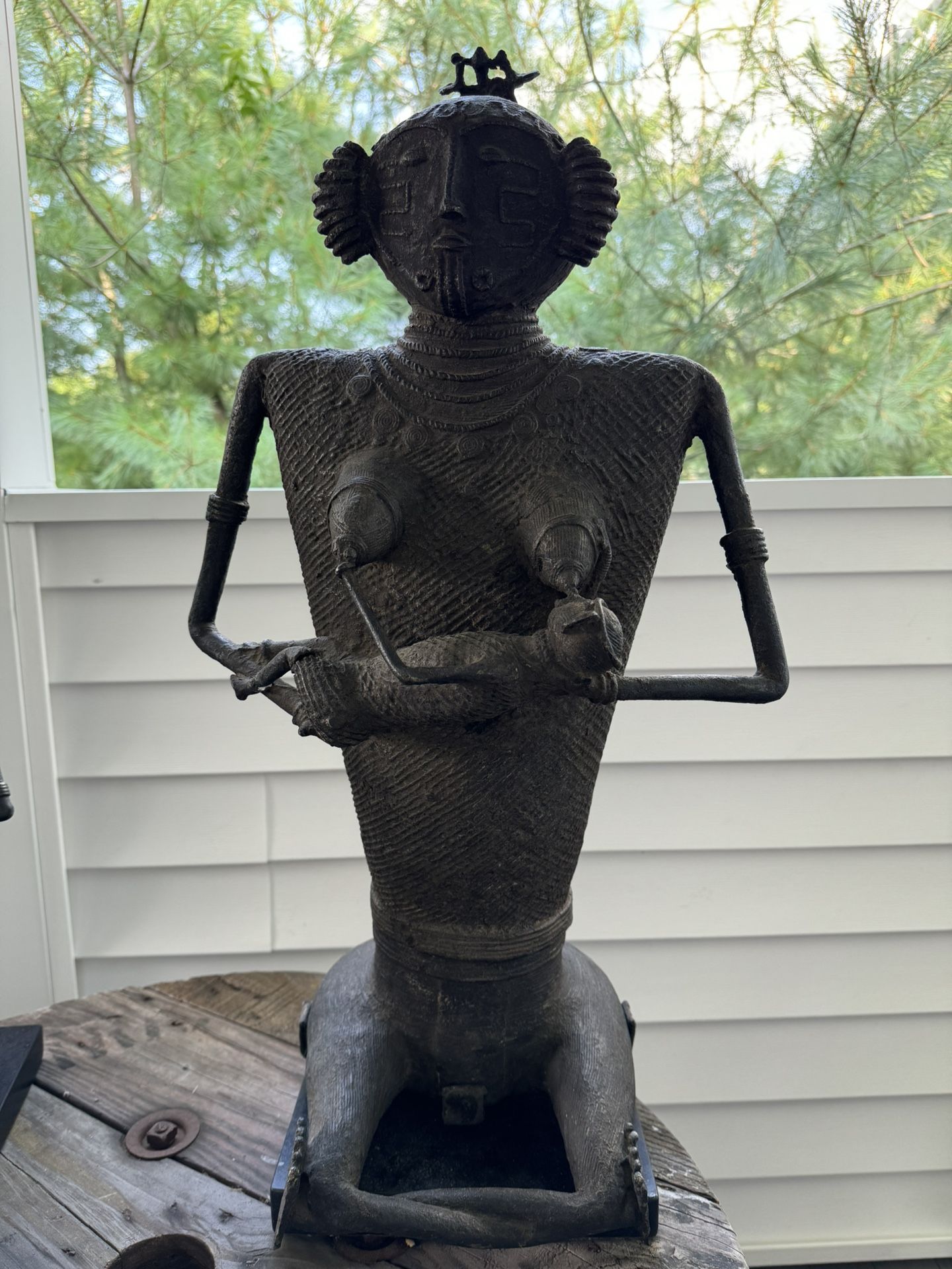Brass Tribal Woman Breastfeeding 