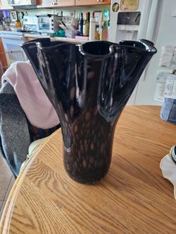 Large black vase with unique design