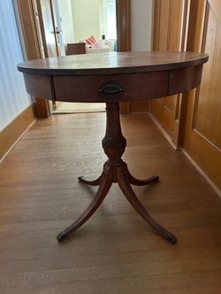 Drum table with drawer