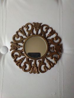 Brass round floral mirror