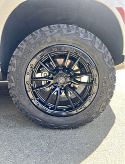 Fuel Rebel Matte Black 20" Wheels 33" Venom XT Tires Package Deal, WE FINANCE