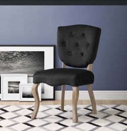 Two French vintage-style distressed wood and velvet dining chairs in black