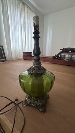 Vintage green glass globe lamp with brass accent